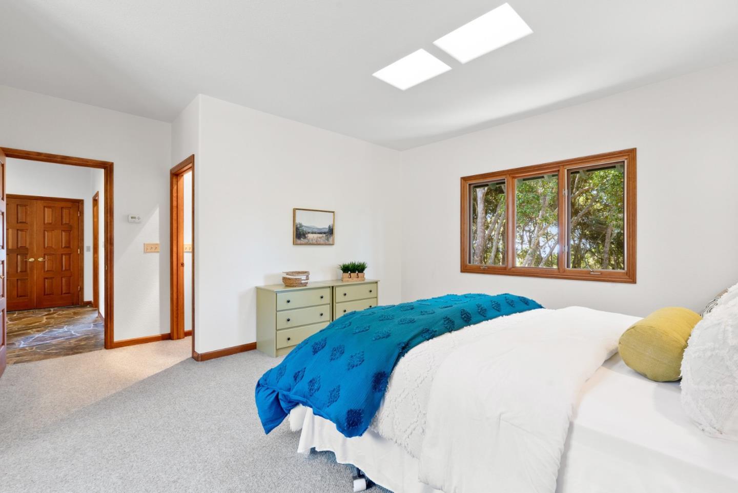 625 Quail Run Road Aptos, CA 95003 - Photo 31 of 49 a bedroom with a bed and a desk