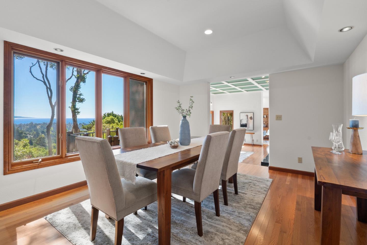 625 Quail Run Road Aptos, CA 95003 - Photo 4 of 49 a view of a dining room with furniture and wooden floor