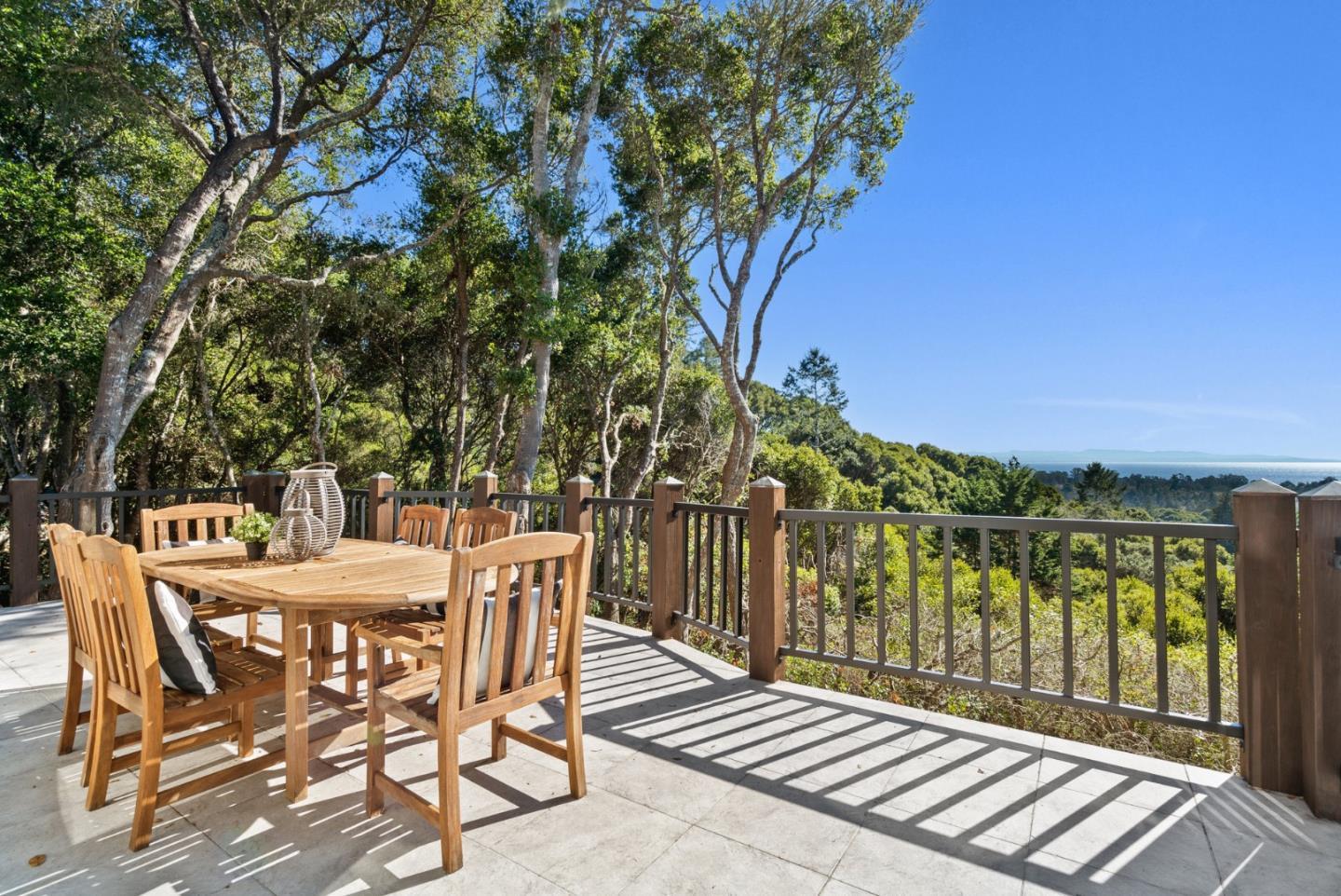 625 Quail Run Road Aptos, CA 95003 - Photo 8 of 49 a view of a chairs and table on the wooden floor