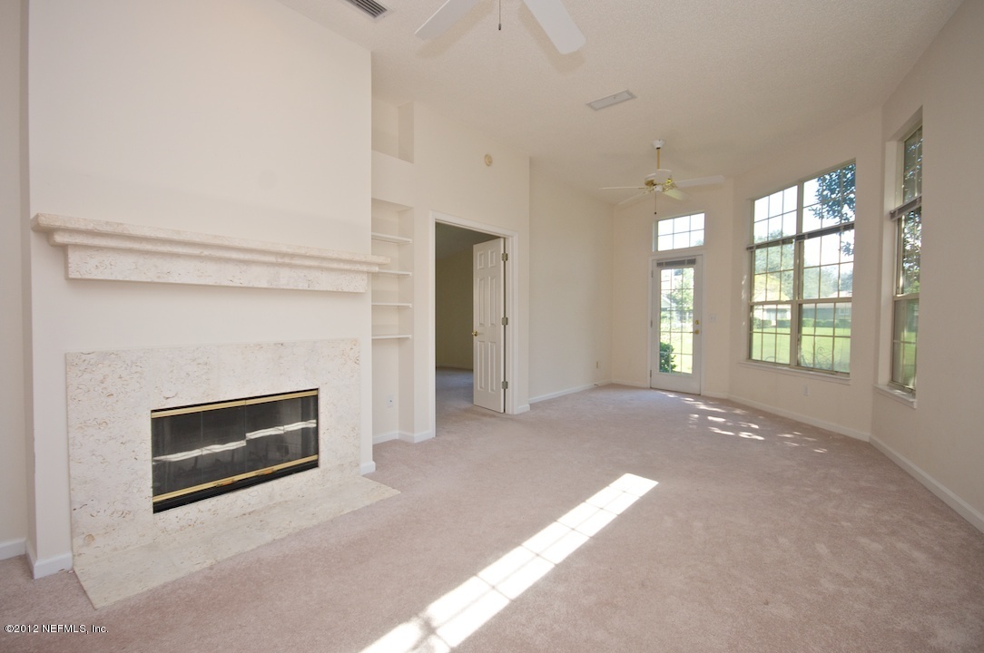 818 Tournament Road Ponte Vedra Beach, FL 32082 - Photo 3 of 20 Living Room to lake view