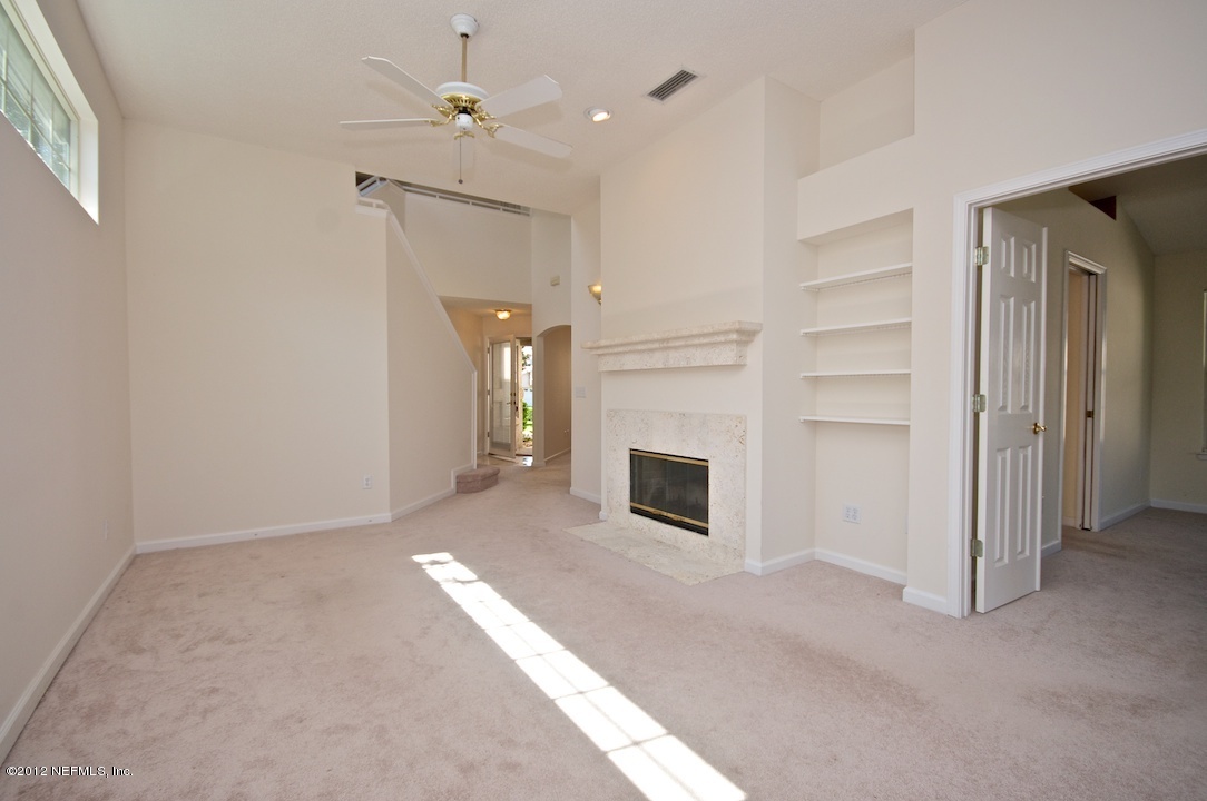 818 Tournament Road Ponte Vedra Beach, FL 32082 - Photo 4 of 20 Living Room w/ master bdrm entry