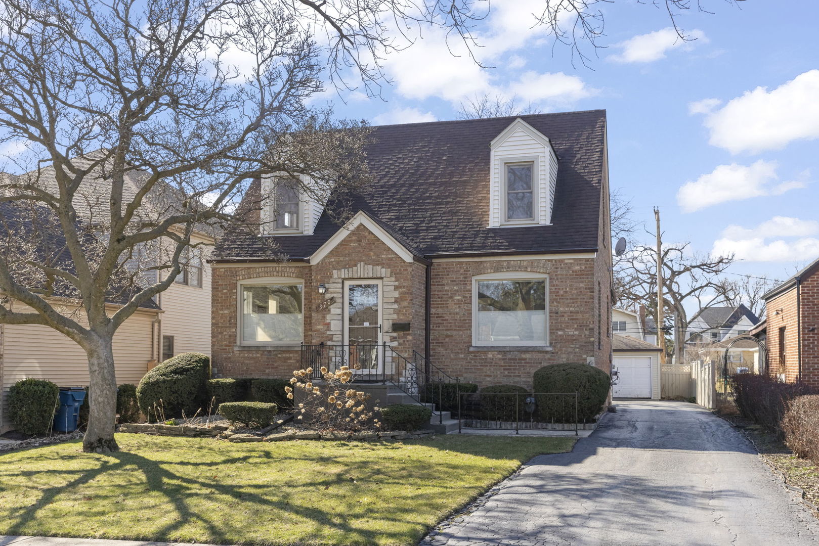 370 Oak Street Elmhurst, IL 60126 - Photo 1 of 35 a front view of house with yard outdoor seating and barbeque oven
