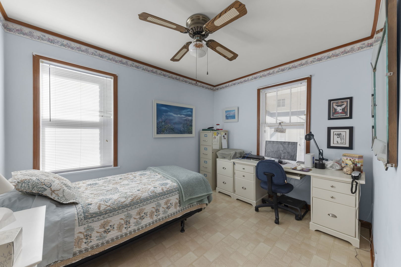 370 Oak Street Elmhurst, IL 60126 - Photo 14 of 35 a bedroom that has a bed and a table in it with window