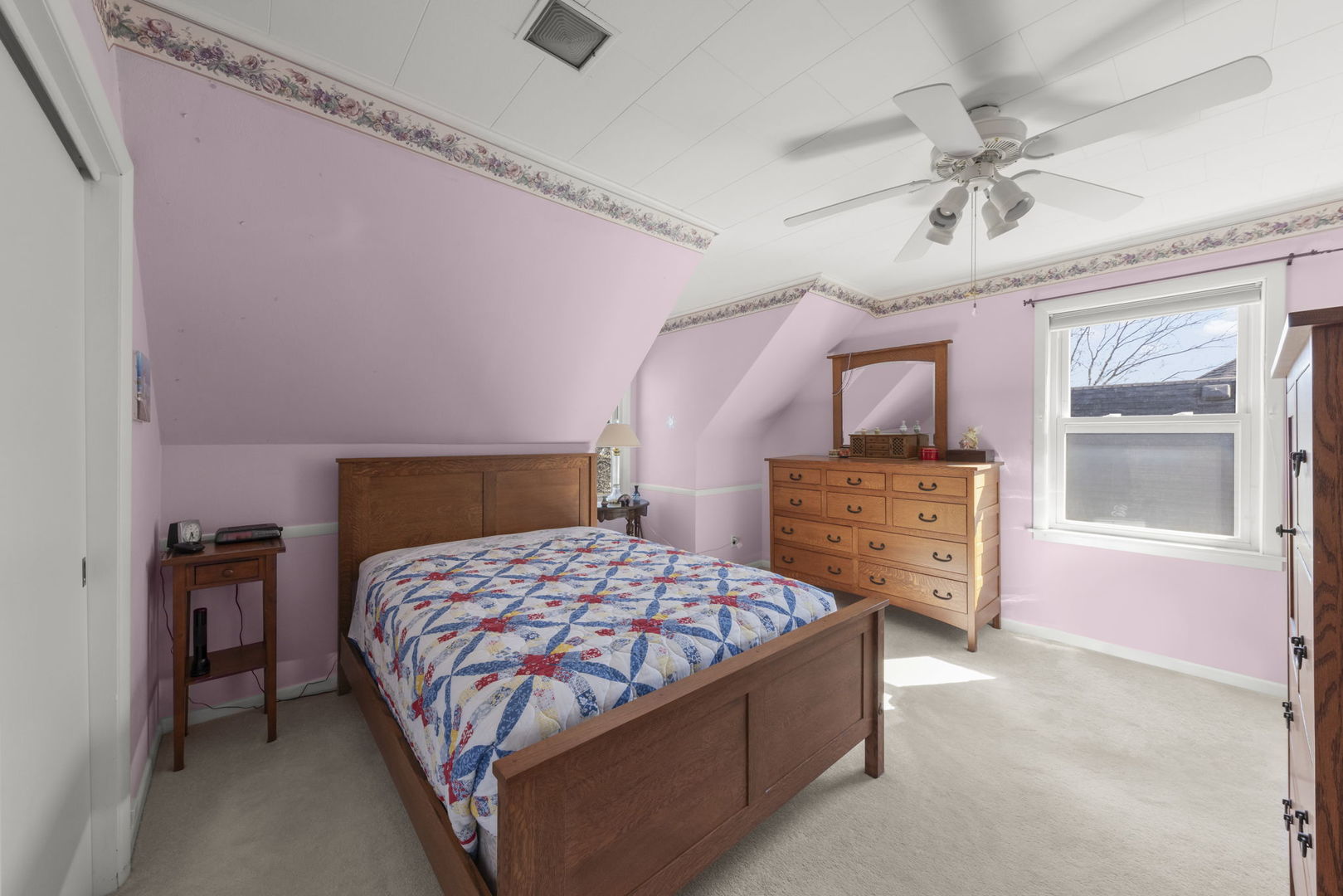 370 Oak Street Elmhurst, IL 60126 - Photo 17 of 35 a bedroom with a bed and a dresser