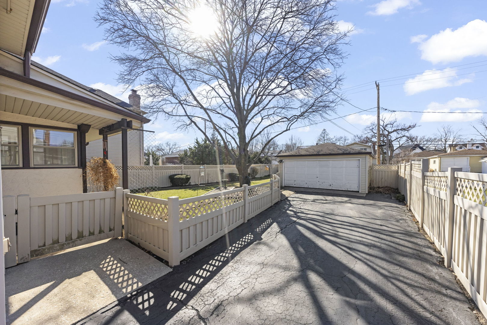 370 Oak Street Elmhurst, IL 60126 - Photo 22 of 35 a view of a house with a wooden fence