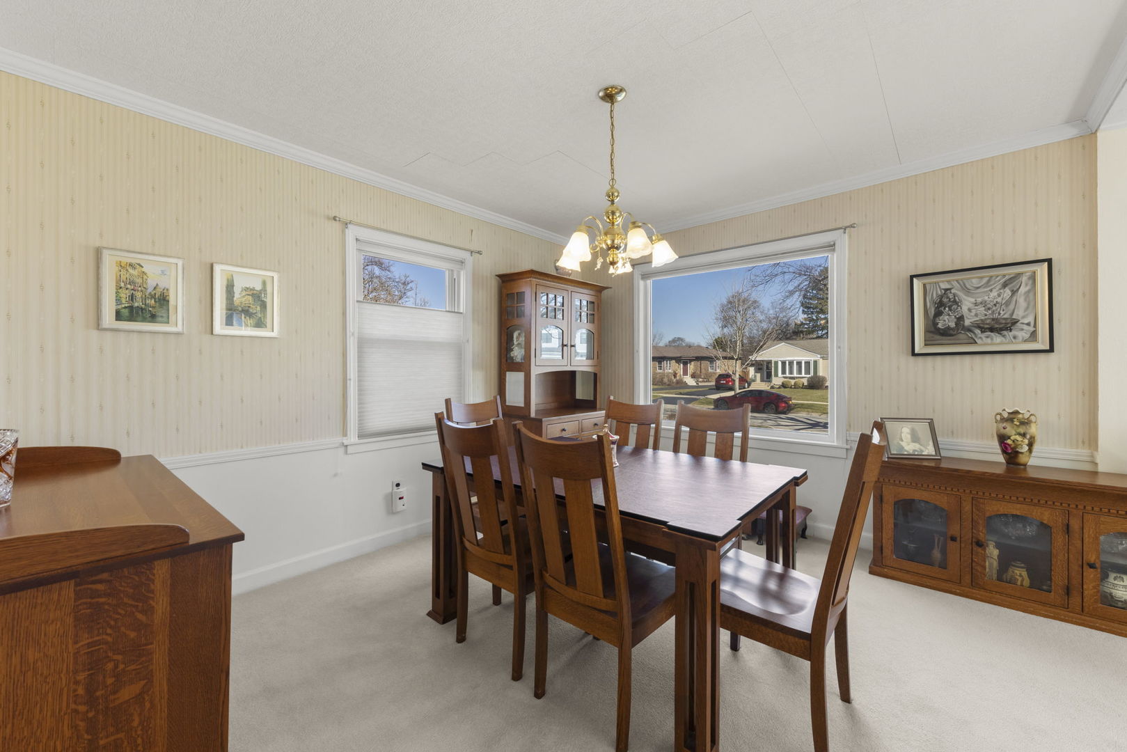 370 Oak Street Elmhurst, IL 60126 - Photo 6 of 35 a view of a dining room with furniture and chandelier
