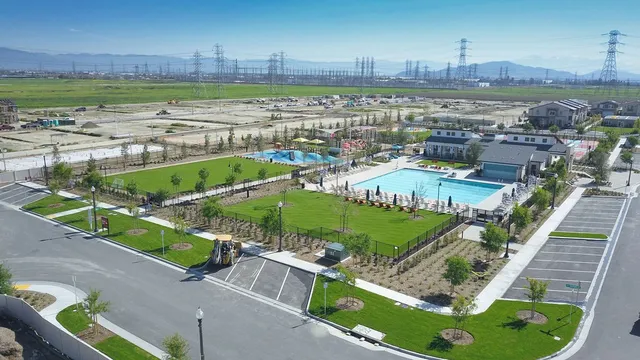 a swimming pool with outdoor seating yard
