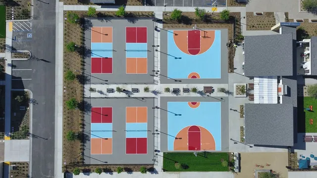 swimming pool view with a garden