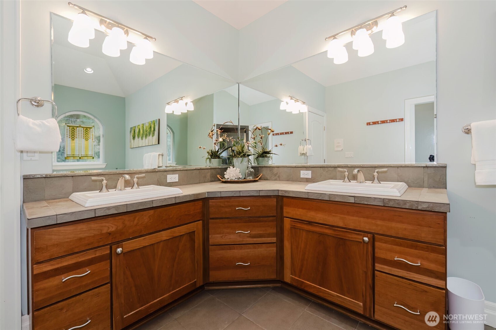 14113 84th Ave Court Northwest Gig Harbor, WA 98329 - Photo 19 of 40 a bathroom with a double vanity sink and a mirror