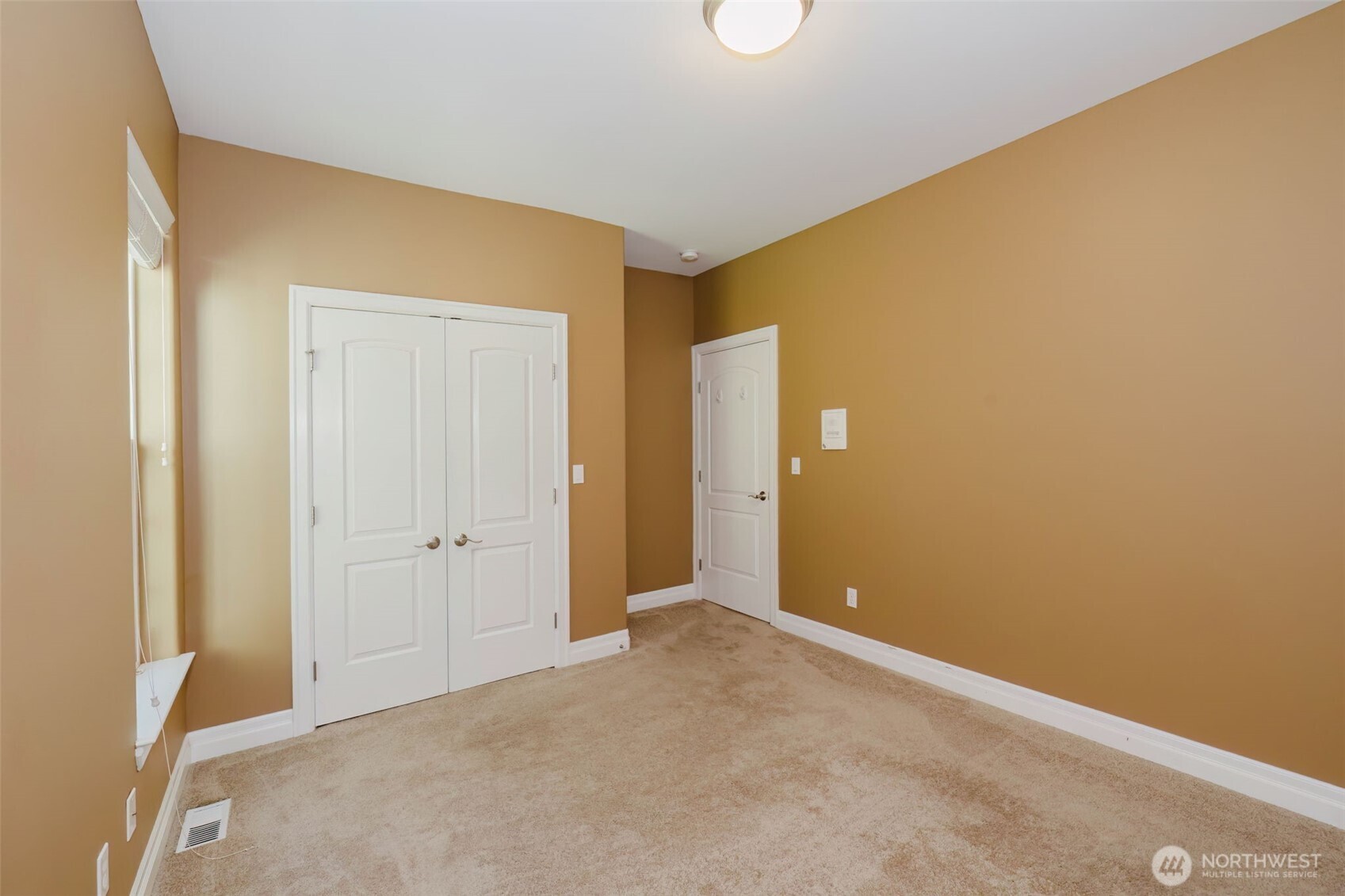 14113 84th Ave Court Northwest Gig Harbor, WA 98329 - Photo 20 of 40 a view of an empty room