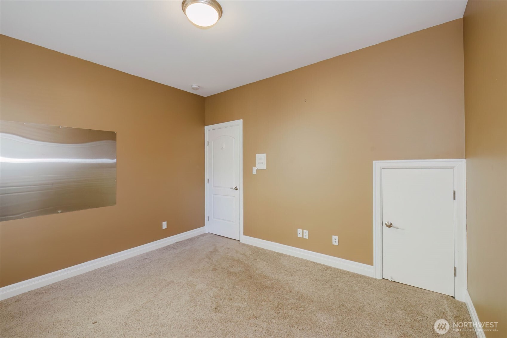 14113 84th Ave Court Northwest Gig Harbor, WA 98329 - Photo 22 of 40 a view of an empty room