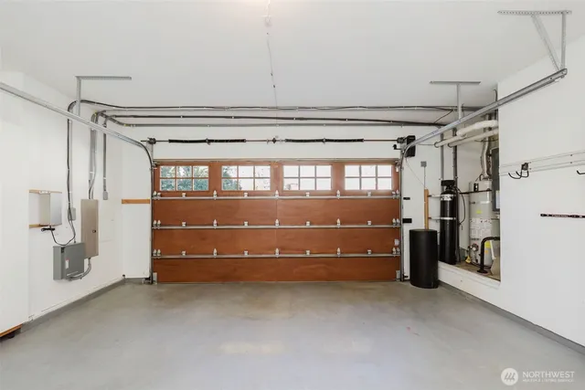 a view of an empty room with a fireplace