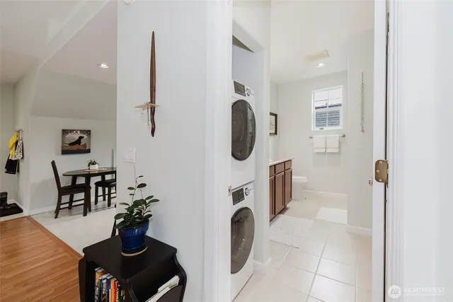 a bathroom with a sink double vanity granite and a mirror
