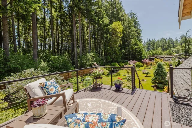 a view of a garden with flowers and plants