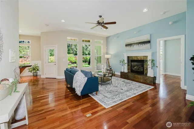 a living room with furniture rug and window