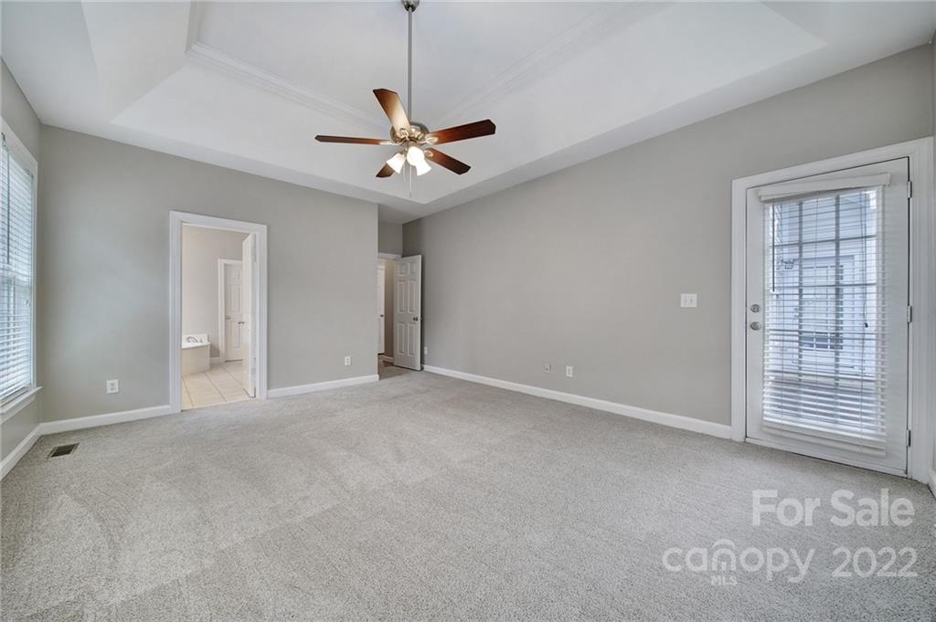 1711 Copperplate Road Charlotte, NC 28262 - Photo 21 of 48 a view of an empty room with a window