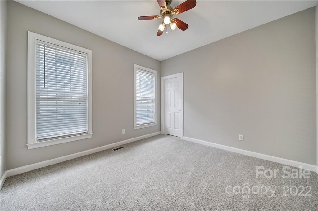 1711 Copperplate Road Charlotte, NC 28262 - Photo 24 of 48 a view of an empty room with a window