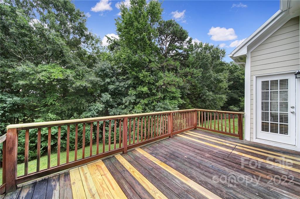 1711 Copperplate Road Charlotte, NC 28262 - Photo 37 of 48 a view of a balcony with wooden floor
