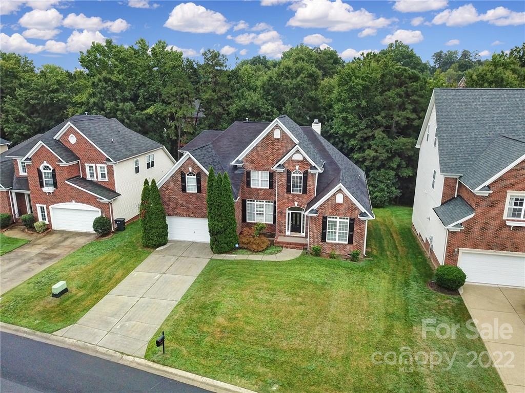 1711 Copperplate Road Charlotte, NC 28262 - Photo 42 of 48 front view of a house with a yard