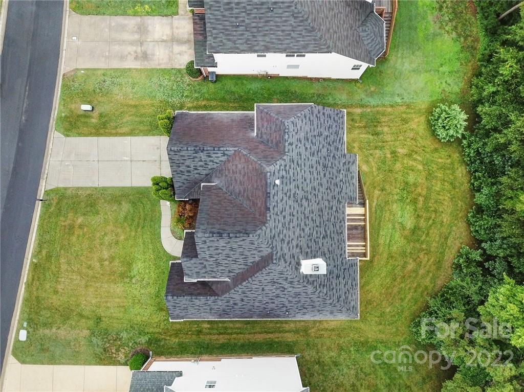 1711 Copperplate Road Charlotte, NC 28262 - Photo 47 of 48 front view of a house with a yard