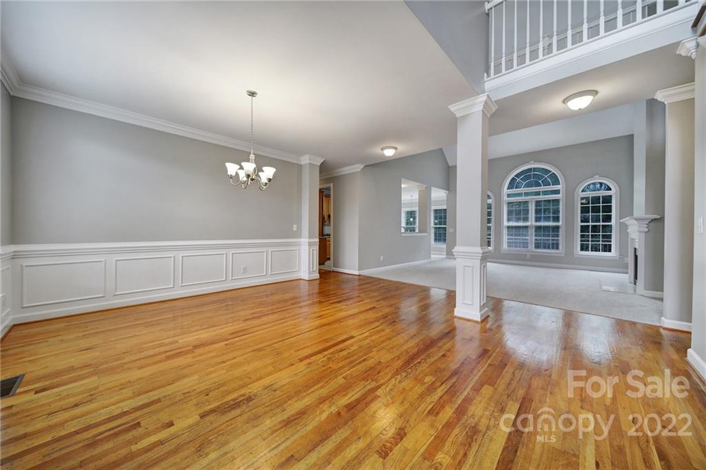 1711 Copperplate Road Charlotte, NC 28262 - Photo 5 of 48 a view of a livingroom with wooden floor