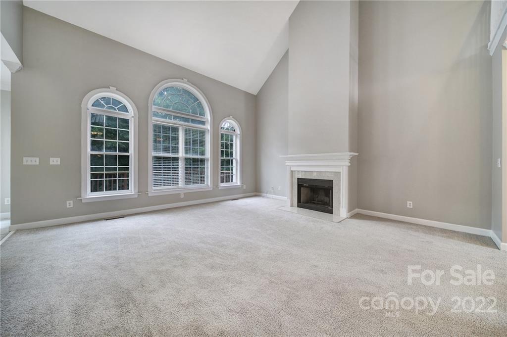 1711 Copperplate Road Charlotte, NC 28262 - Photo 10 of 48 an empty room with windows