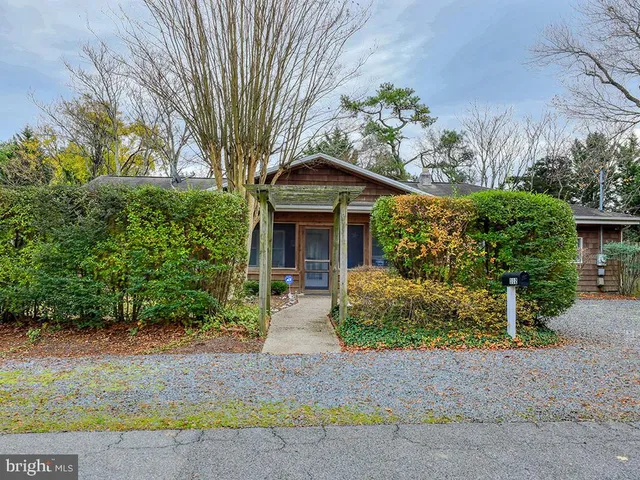a front view of a house with patio