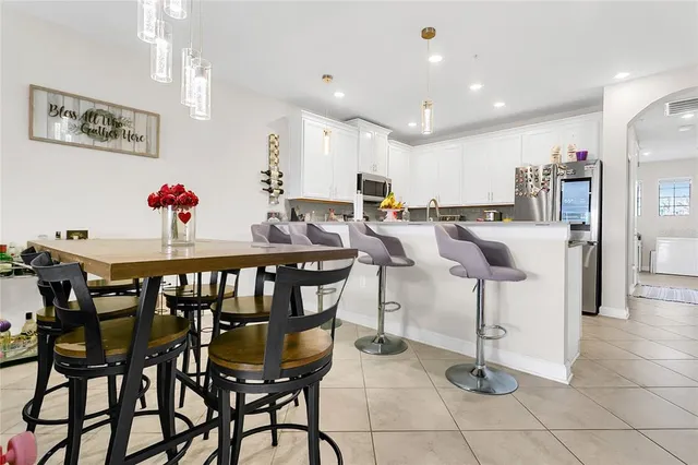 a view of a dining room with furniture