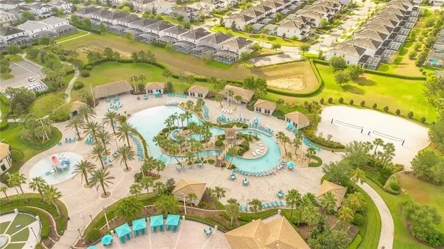 an aerial view of a pool patio and mountain view