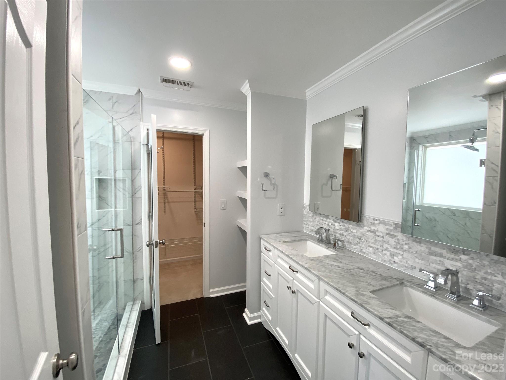 161 Mott Road Mooresville, NC 28115 - Photo 16 of 27 a bathroom with a double vanity sink mirror and double
