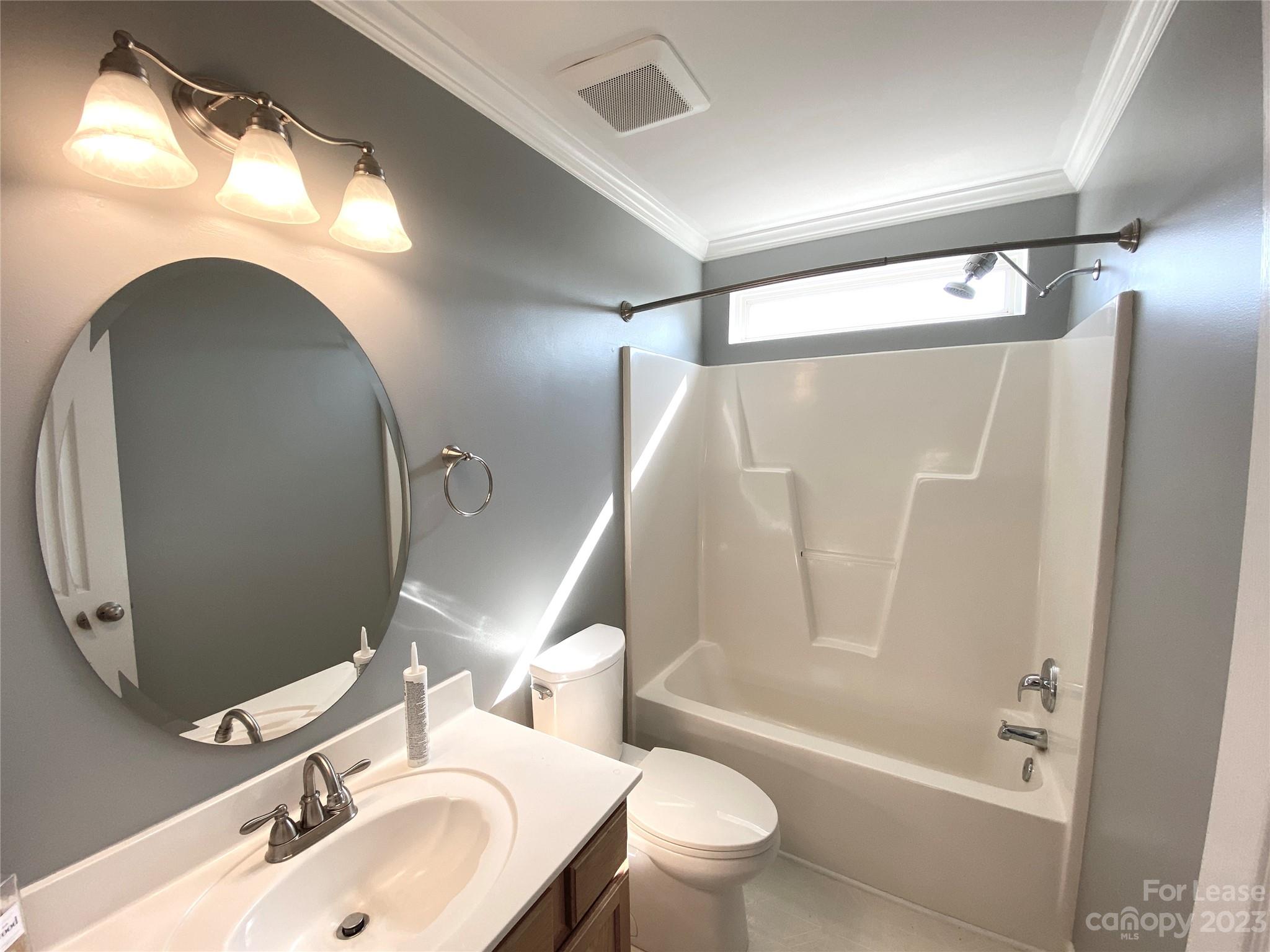 161 Mott Road Mooresville, NC 28115 - Photo 18 of 27 a bathroom with a sink mirror toilet and bathtub