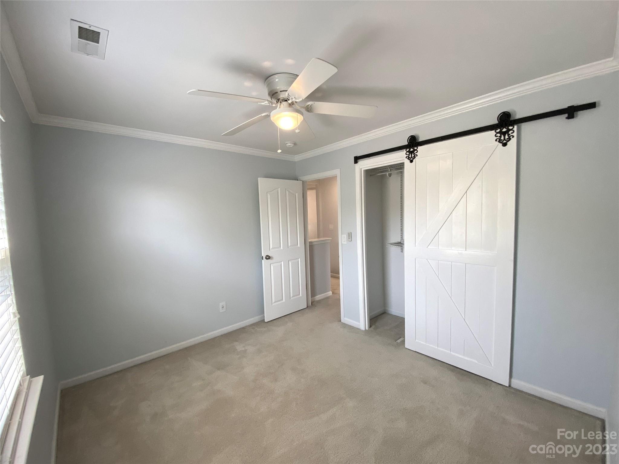 161 Mott Road Mooresville, NC 28115 - Photo 19 of 27 a view of an empty room with a window