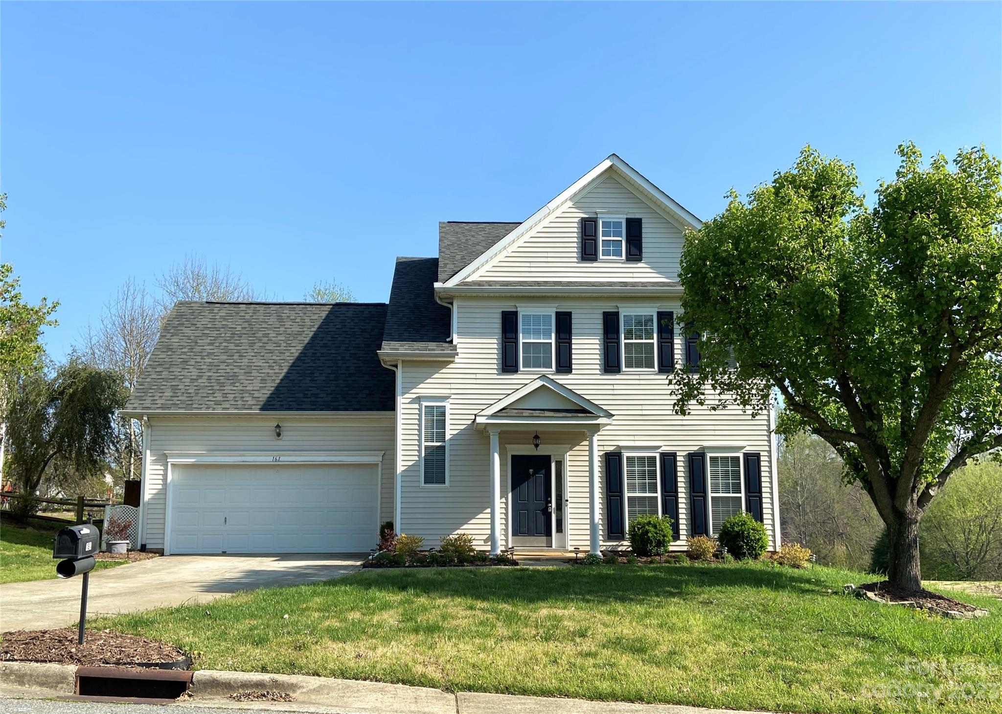 161 Mott Road Mooresville, NC 28115 - Photo 2 of 27 a front view of a house with a yard