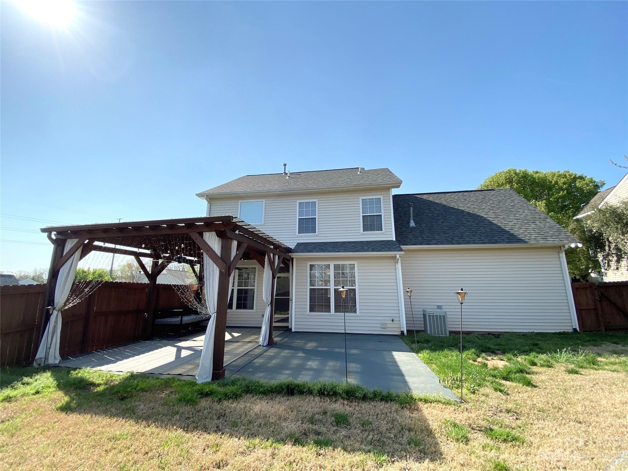 161 Mott Road Mooresville, NC 28115 - Photo 24 of 27 a front view of a house with garden