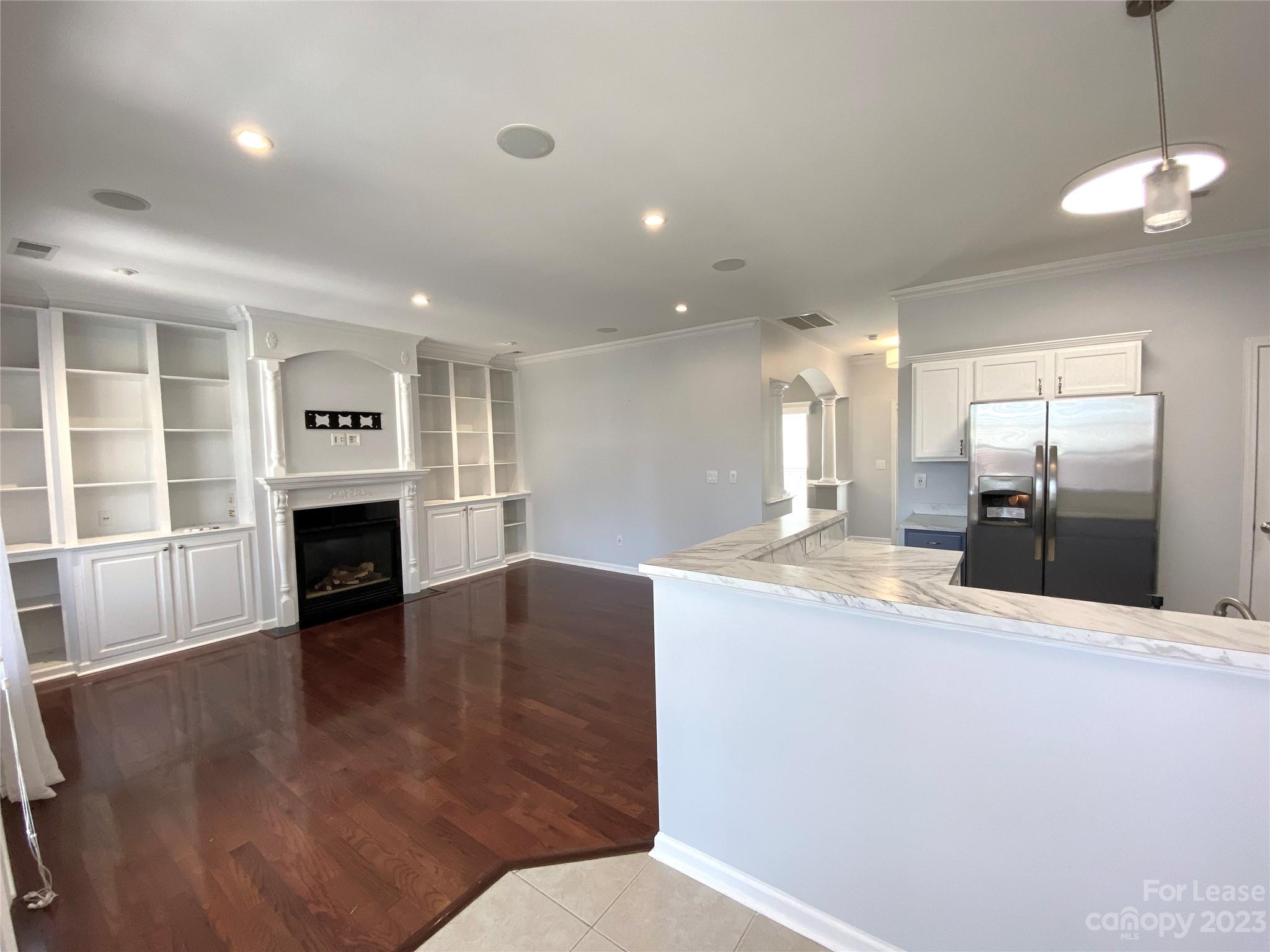 161 Mott Road Mooresville, NC 28115 - Photo 7 of 27 a large living room with a fireplace