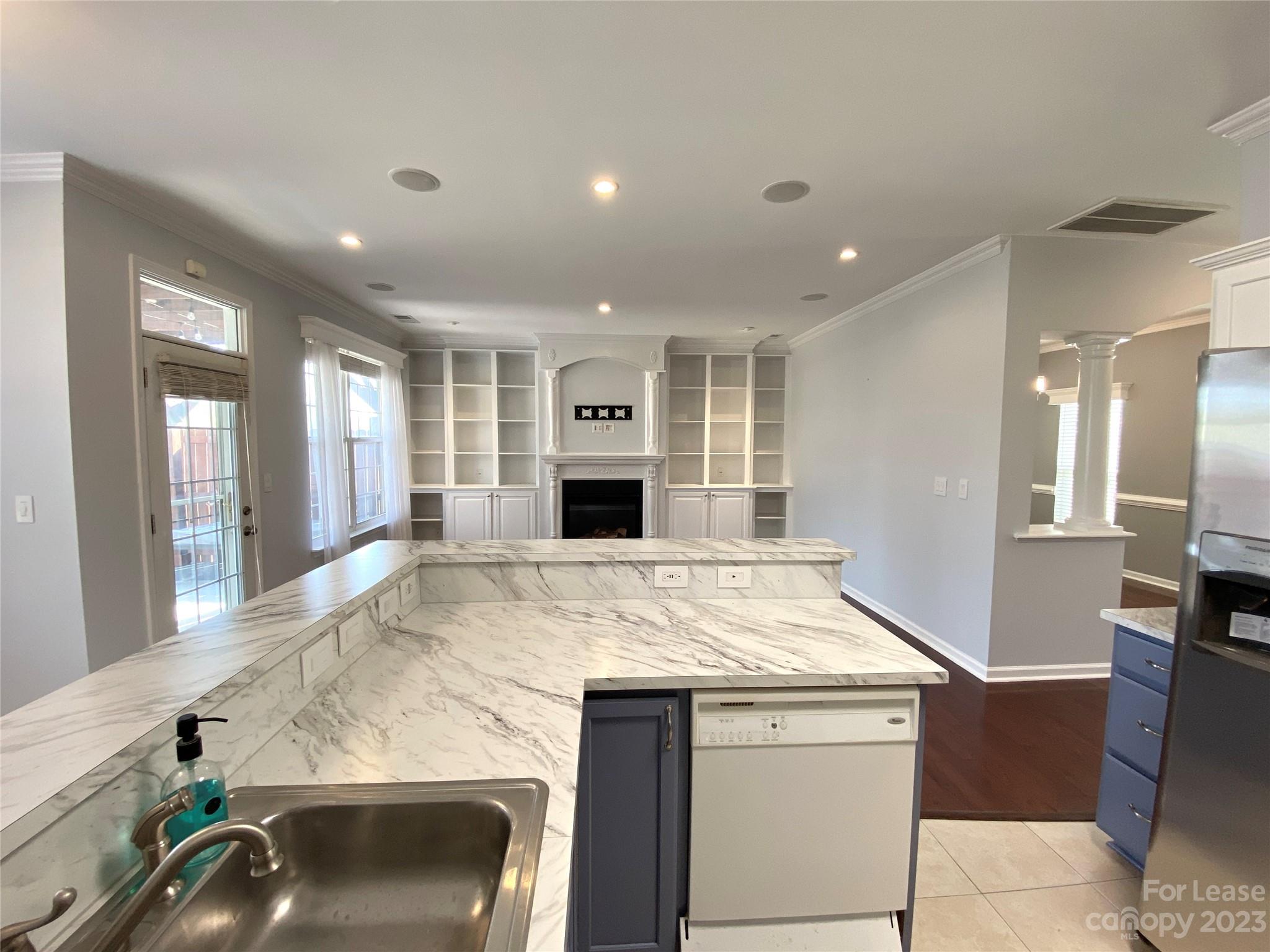 161 Mott Road Mooresville, NC 28115 - Photo 10 of 27 a view of kitchen with granite countertop cabinets and refrigerator