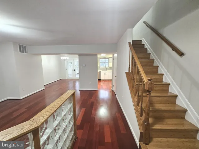 a view of entryway with wooden floor