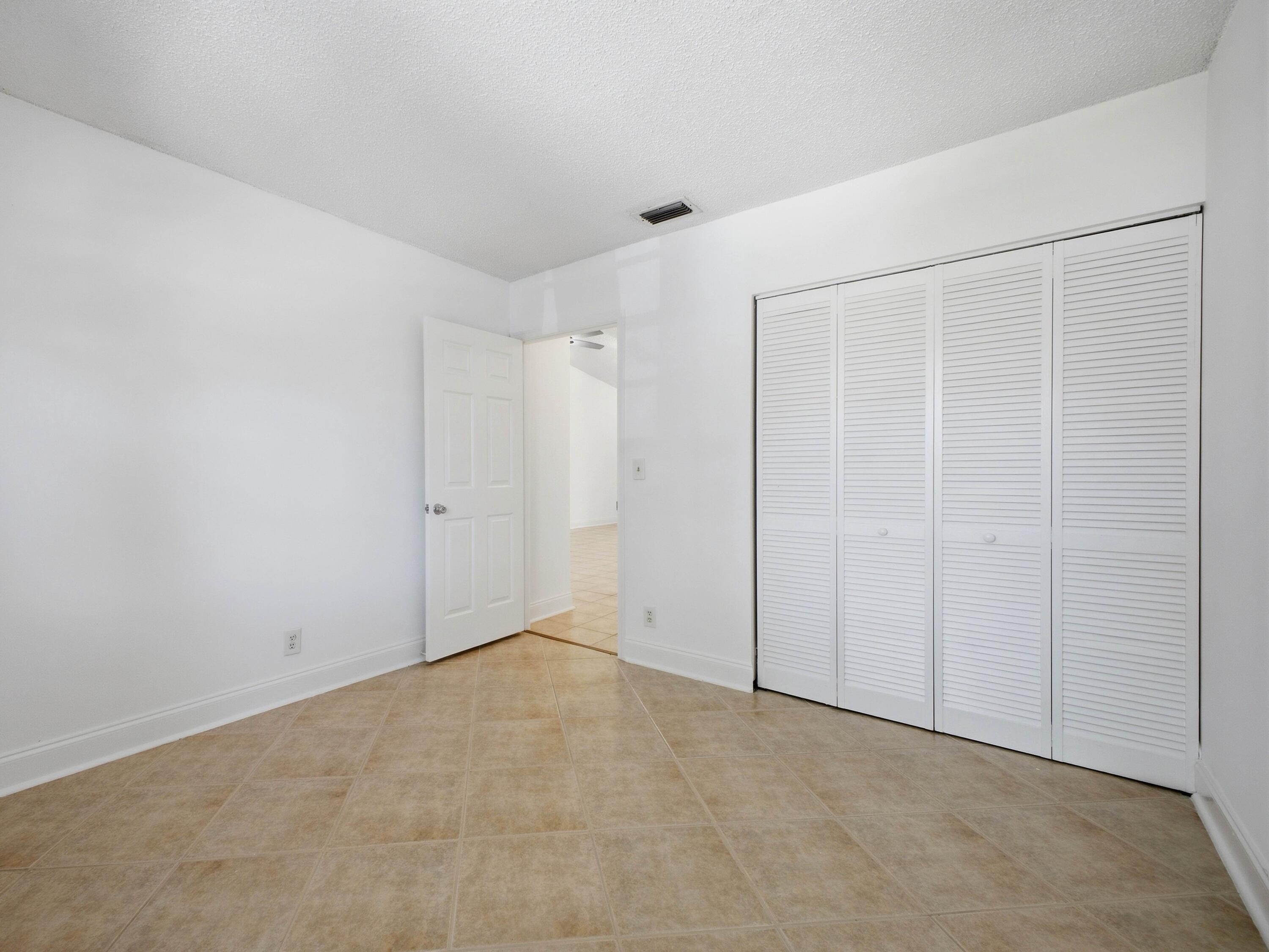 321 Norwood Terrace, Unit N221 Boca Raton, FL 33431 - Photo 21 of 36 Guest Bedroom