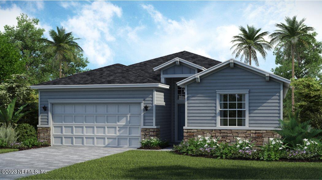 35 Hammer Circle St. Johns, FL 32259 - Photo 1 of 22 a front view of a house with a garden