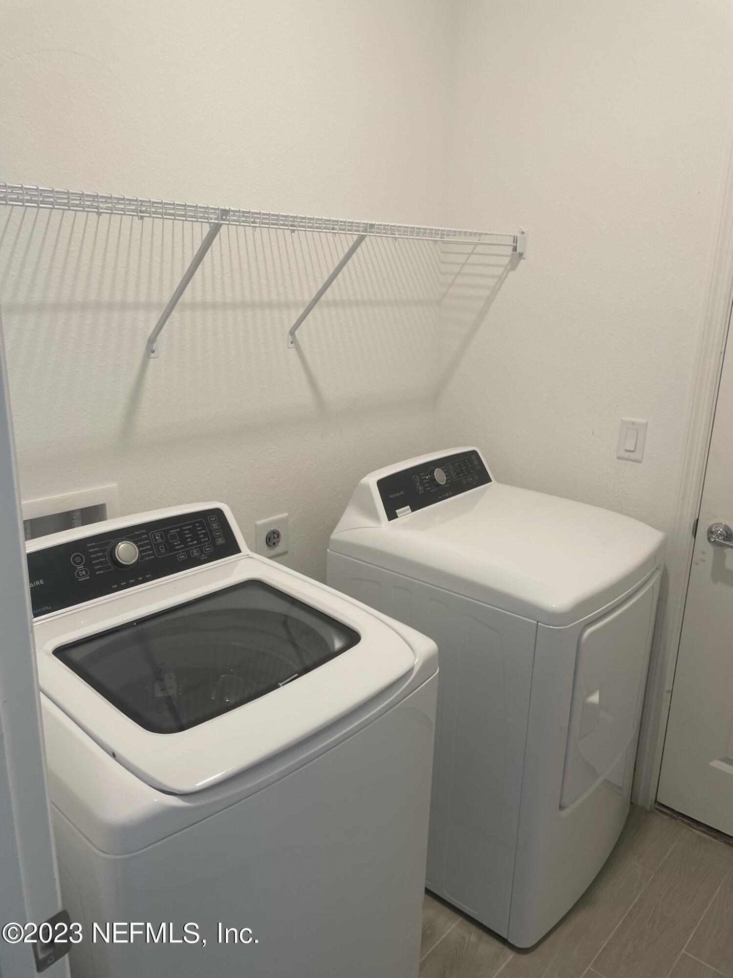 35 Hammer Circle St. Johns, FL 32259 - Photo 19 of 22 a utility room with dryer and washer
