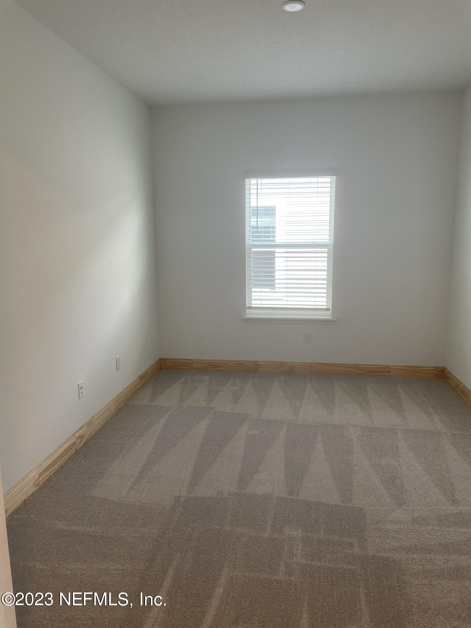 35 Hammer Circle St. Johns, FL 32259 - Photo 7 of 22 an empty room with a window