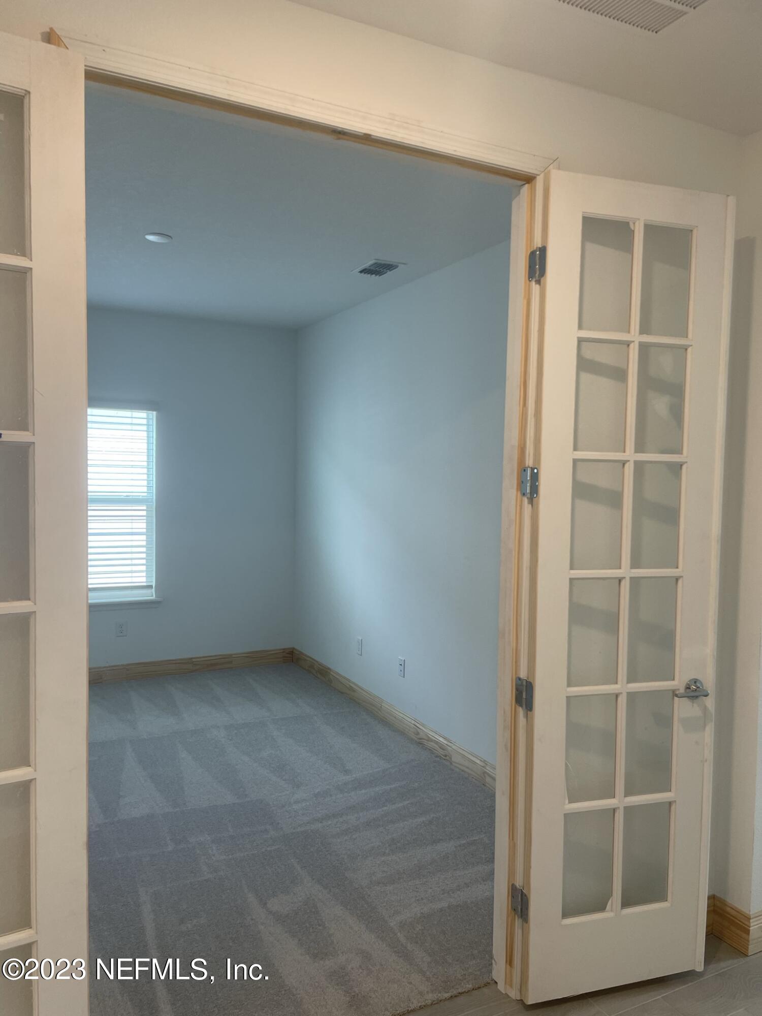 35 Hammer Circle St. Johns, FL 32259 - Photo 8 of 22 an empty room with windows