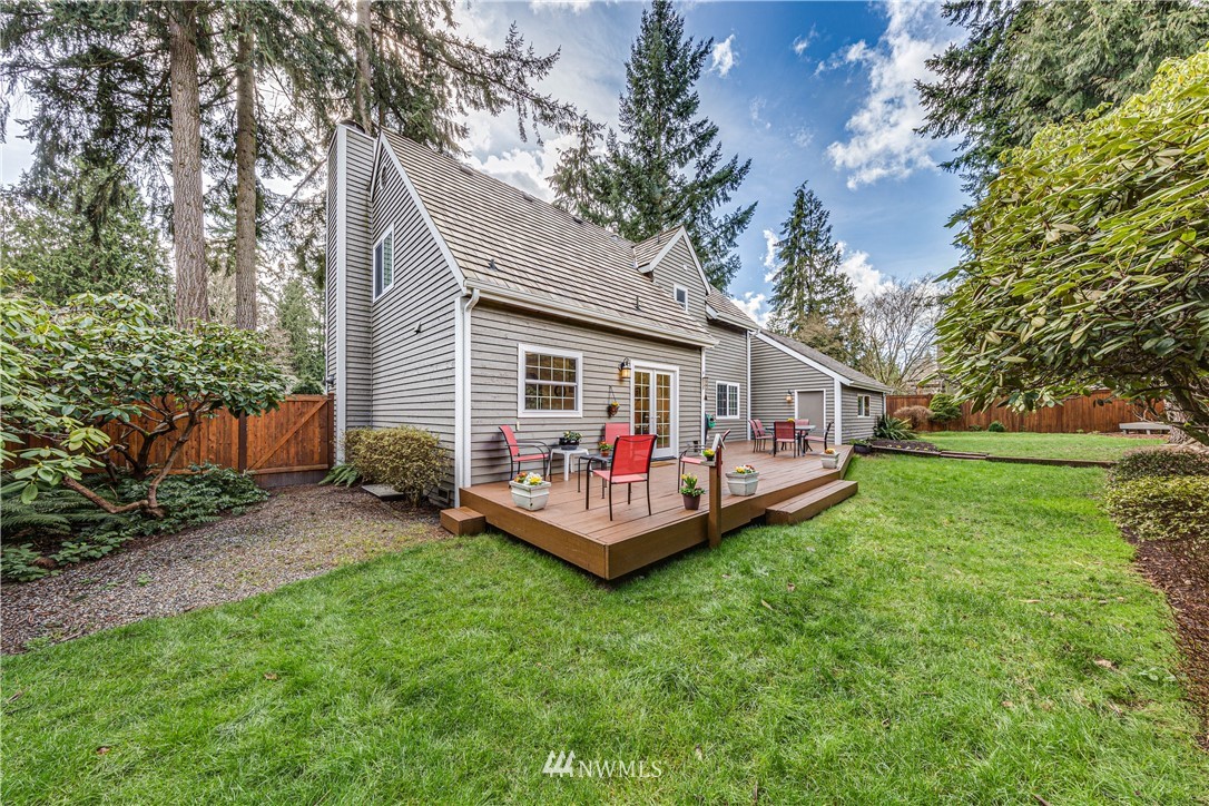 3121 166th Place Southeast Bothell, WA 98012 - Photo 26 of 28 a front view of house with garden