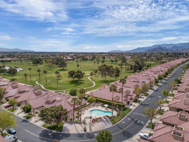 an aerial view of lake and city