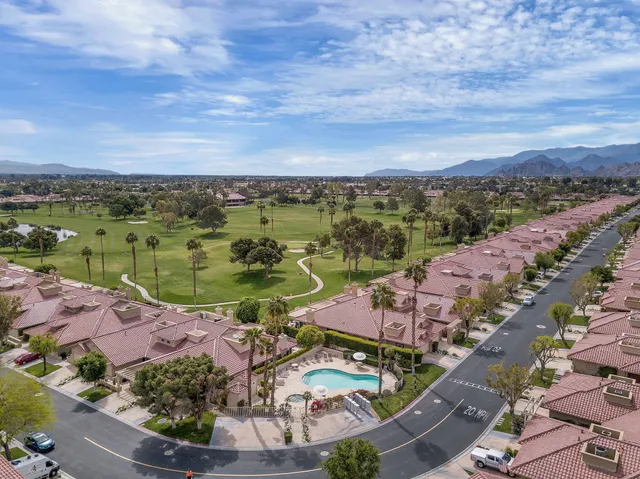 an aerial view of lake and city