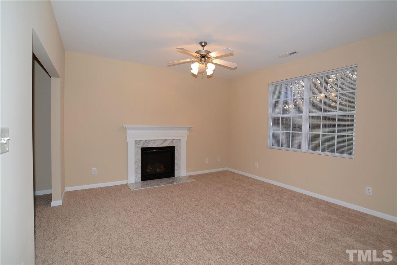 4604 Marathon Lane Raleigh, NC 27616 - Photo 12 of 25 a view of a livingroom with a ceiling fan and window