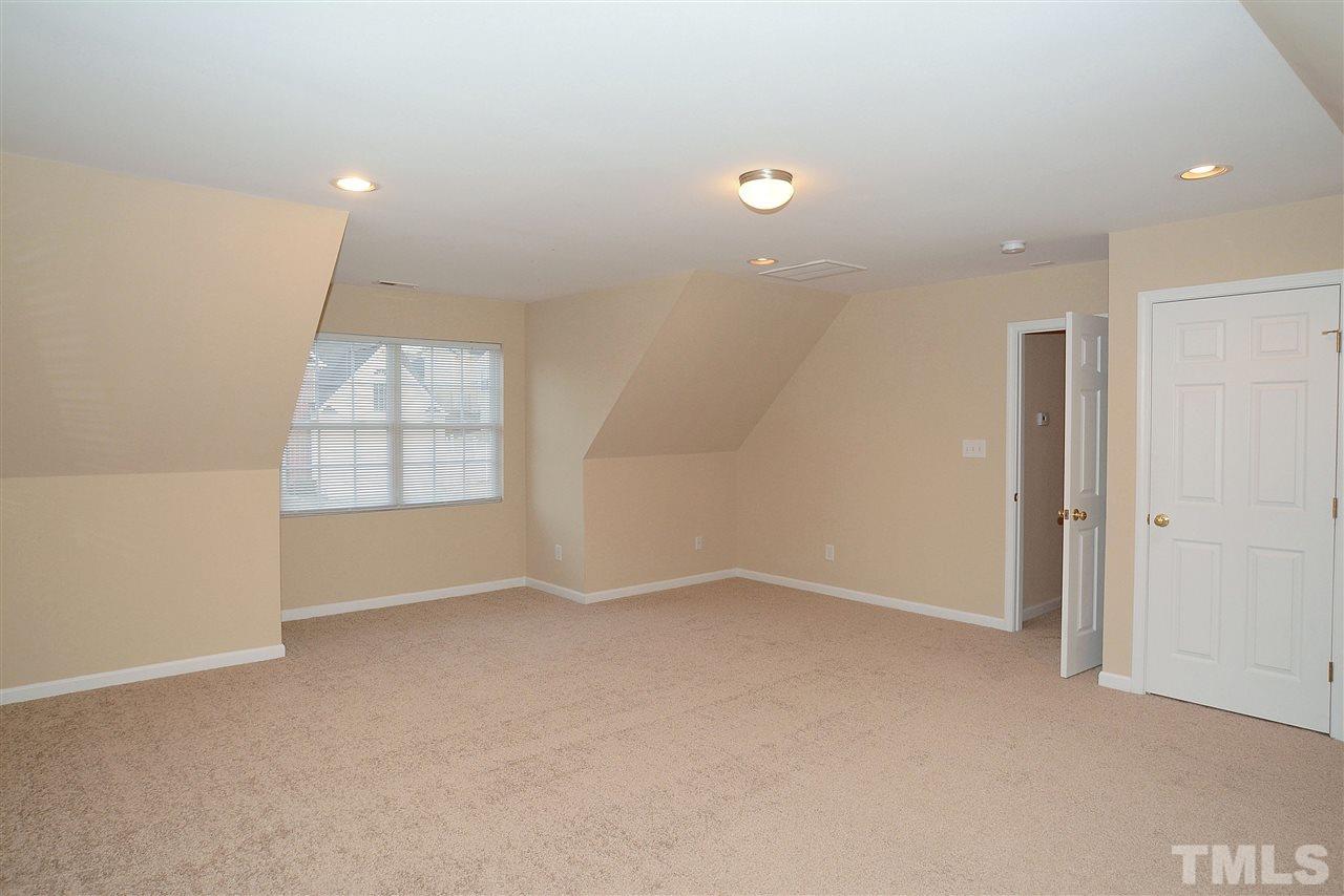 4604 Marathon Lane Raleigh, NC 27616 - Photo 22 of 25 an empty room with windows and closet