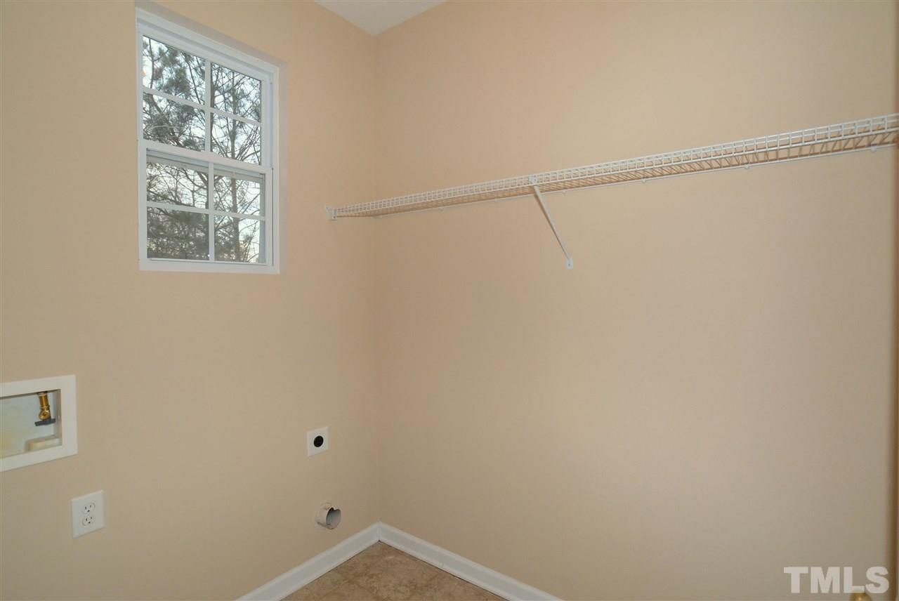 4604 Marathon Lane Raleigh, NC 27616 - Photo 23 of 25 a view of a small space with racks on the wall
