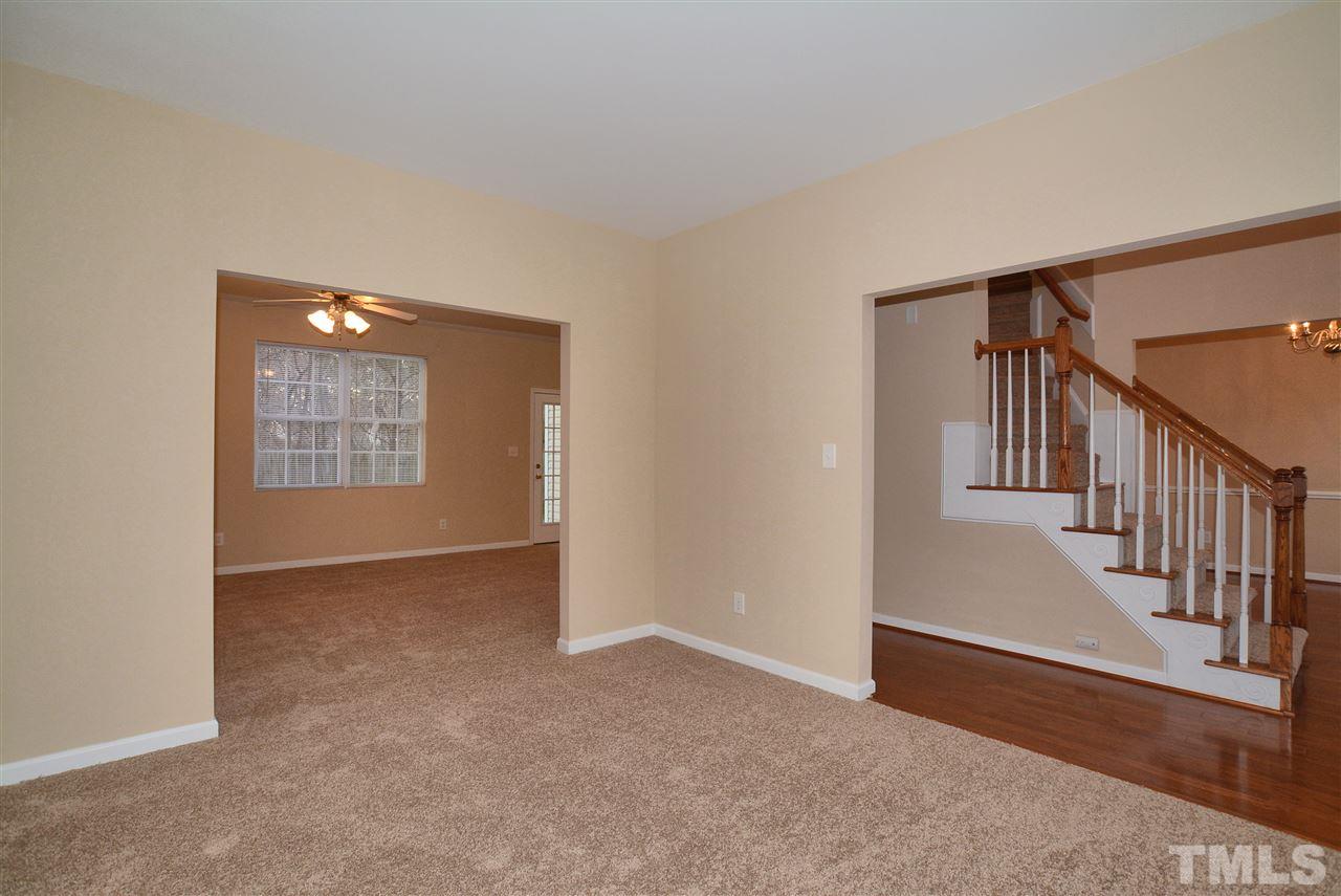4604 Marathon Lane Raleigh, NC 27616 - Photo 5 of 25 a view of an empty room with stairs