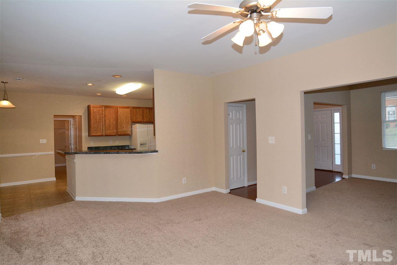 4604 Marathon Lane Raleigh, NC 27616 - Photo 10 of 25 a view of kitchen with refrigerator and microwave